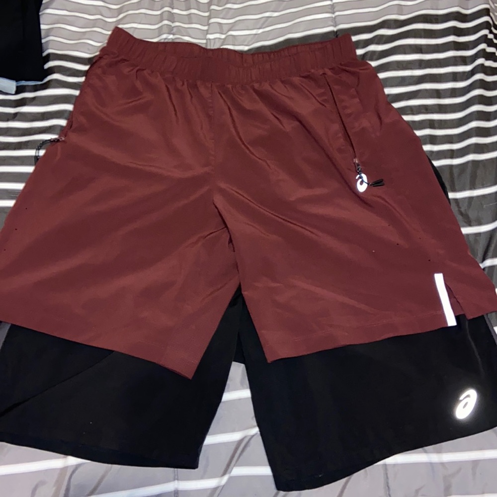 2 pairs of Asics Shorts